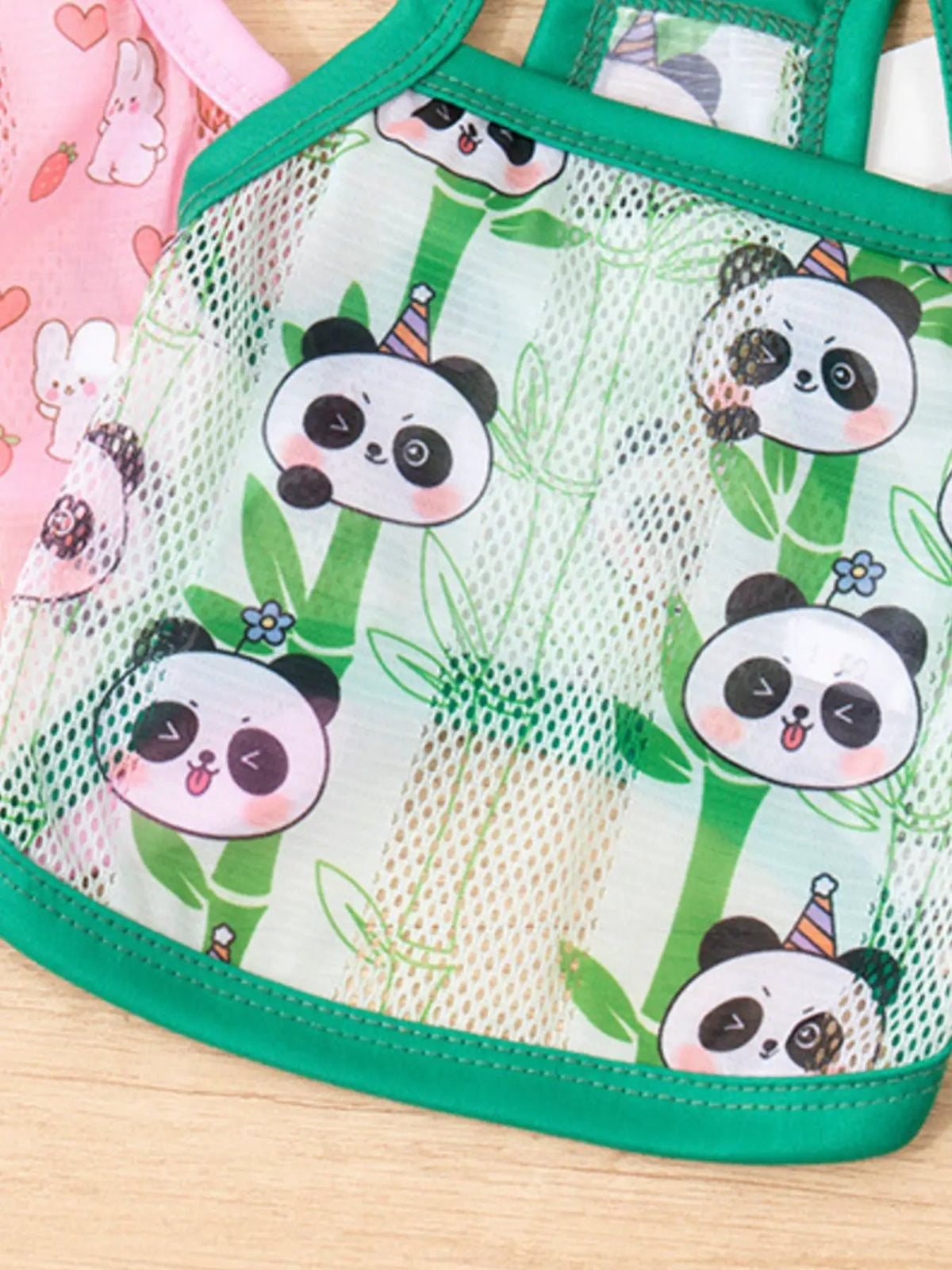 Breathable mesh pet top with green trim and panda print