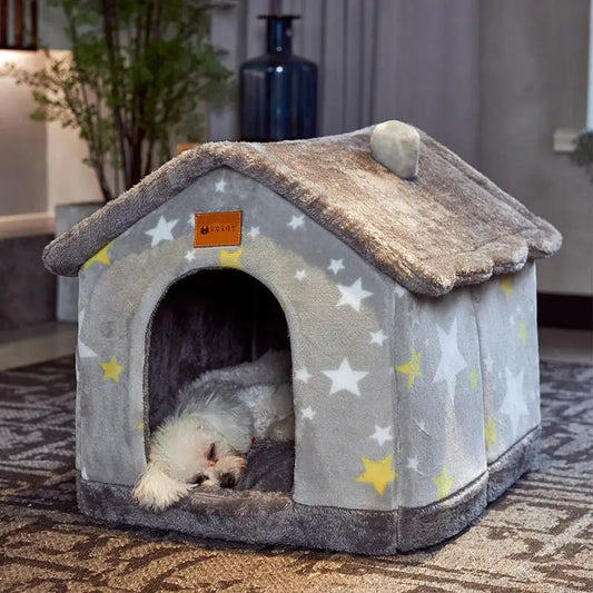 AdTec foldable dog house in plush gray star-pattern fabric; small dog resting inside cozy enclosed cave.