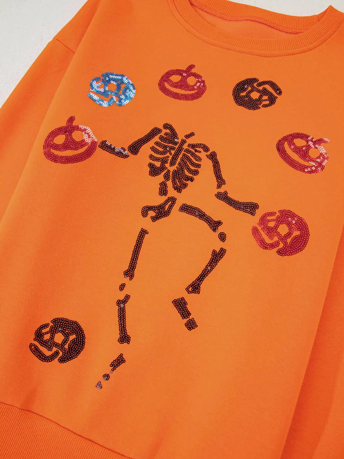 Dancing Critters Sequin Halloween Crewneck Sweatshirt in orange with pumpkin and skeleton sequin designs