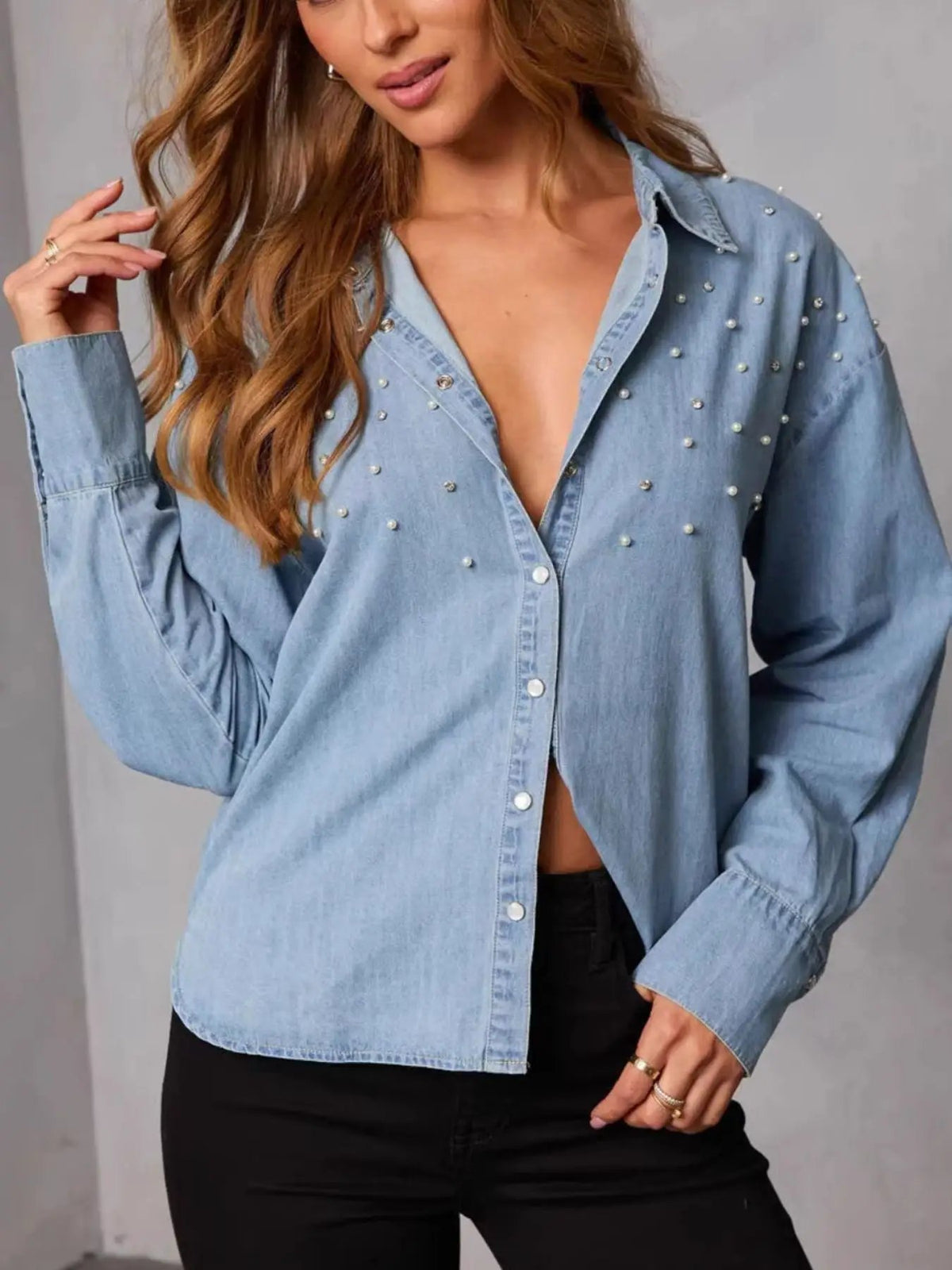 Denim button-up shirt with pearl embellishments in light blue, soft comfort fit by Trendsi