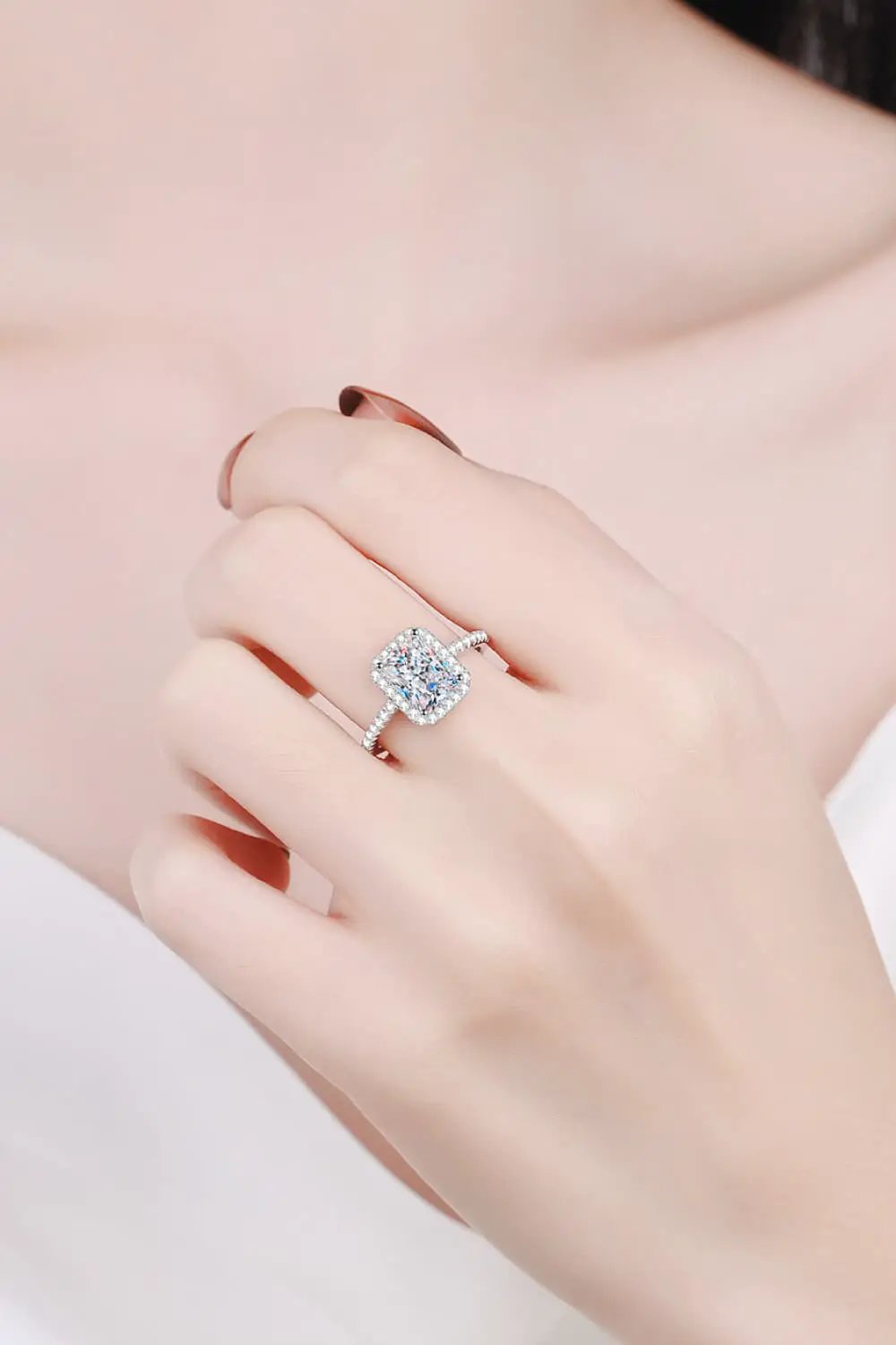 2 Carat Moissanite halo ring, 925 sterling silver, on finger
