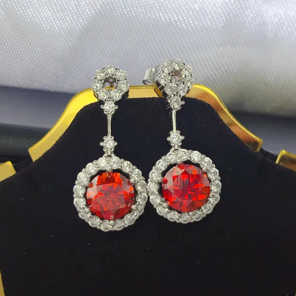 Pair of 4 Carat Ruby Red Crystal Drop Earrings with Rhinestone Halo