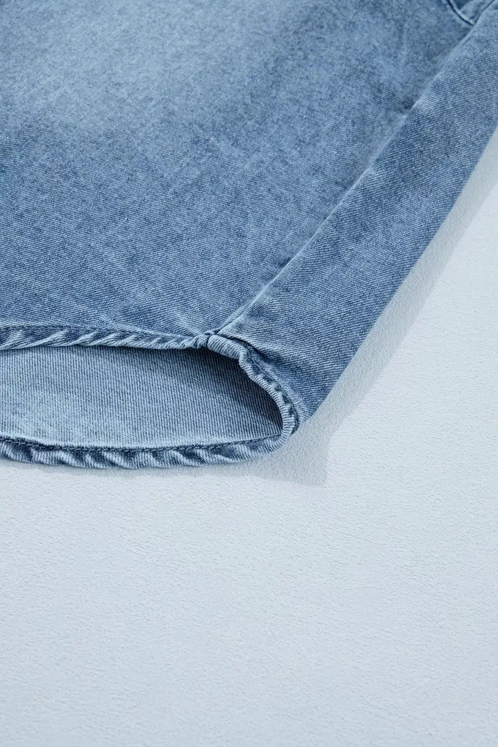 Girls Frilled Short Sleeve Snap Button Lightweight Denim Shirt in light blue denim with curved sleeve hem