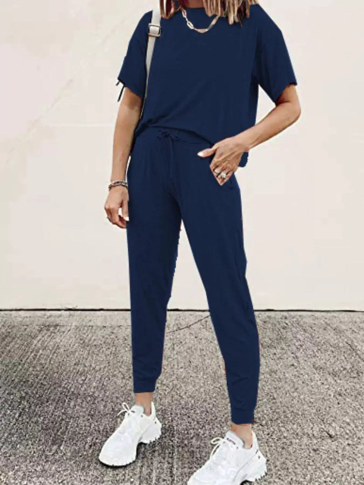 Plus-size navy blue round-neck top and drawstring pants set by Trendsi