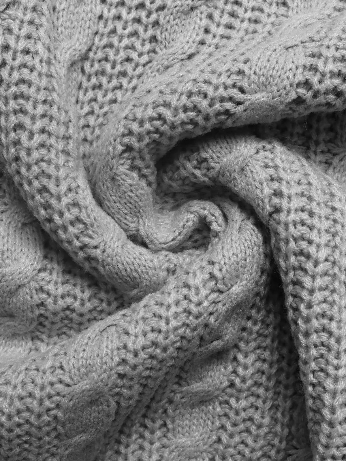 Cable-knit half-zip sweater in gray acrylic fabric, close-up