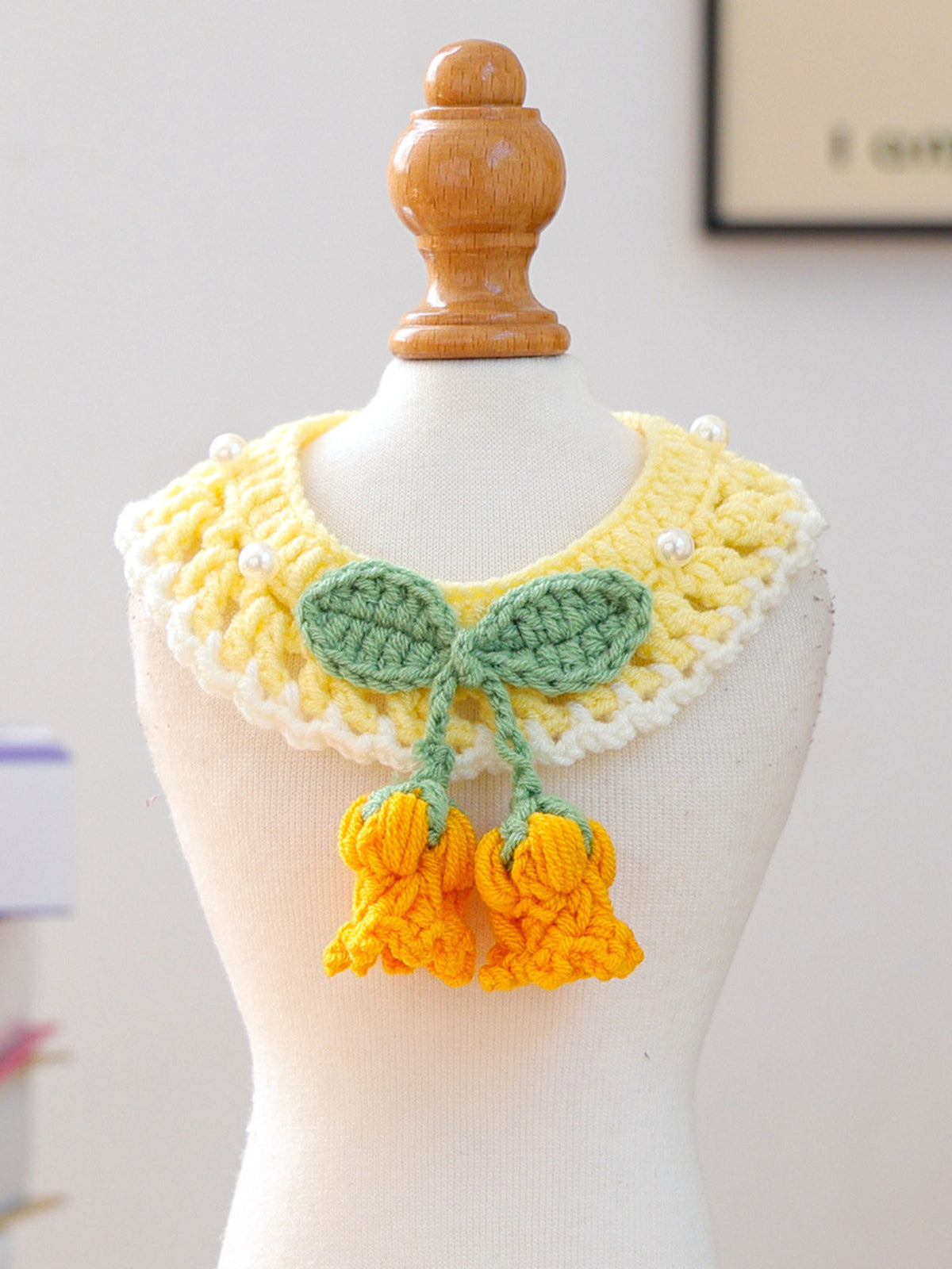 Trendsi contrast pet scarf: yellow crocheted collar with white trim, green leaf motif and orange tassels