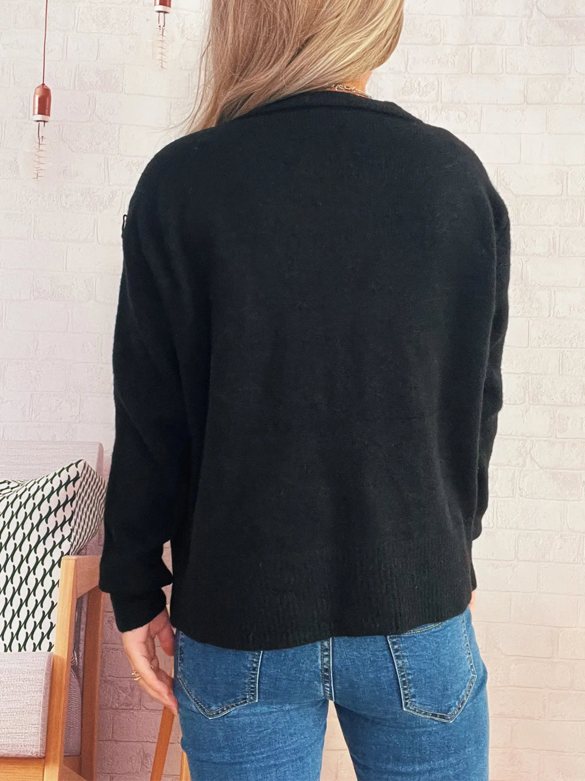 Ribbed button-front knit cardigan in black, stretchy layering top by Trendsi