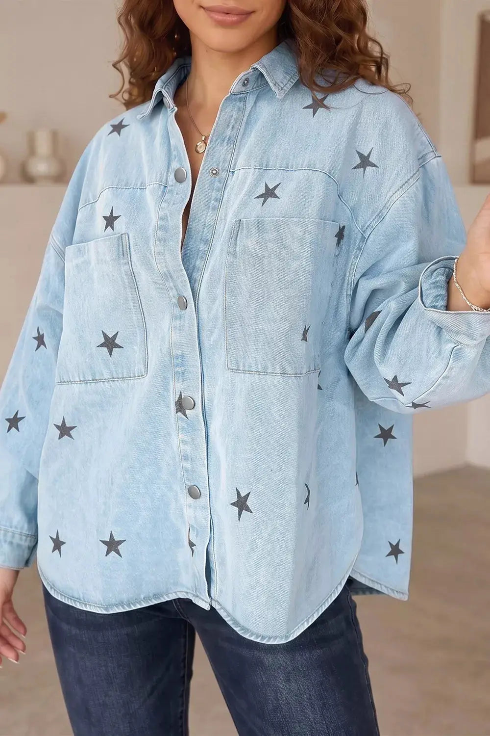 Light-wash star-print denim jacket with front pockets and snap buttons, Trendsi.
