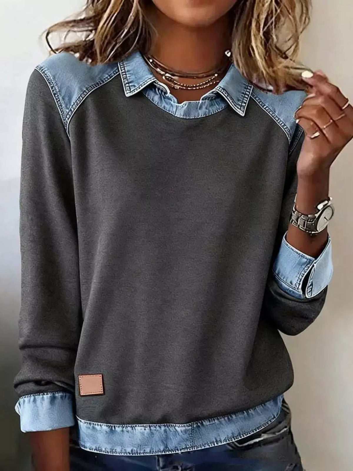 Classic plus-size long-sleeve top with light denim collar and shoulder trim on charcoal gray fabric