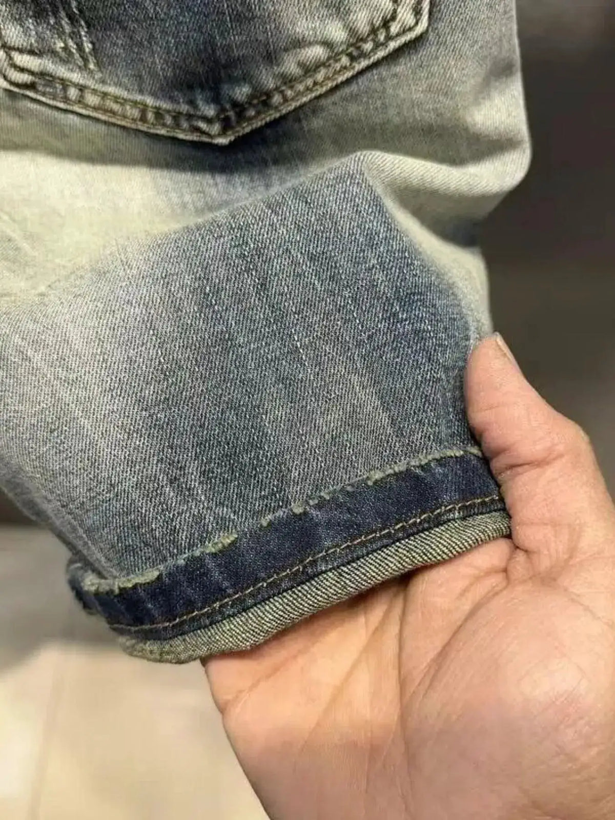 Men's washed denim stretch shorts; lightweight relaxed fit, blue denim with rolled cuff, Trendsi.