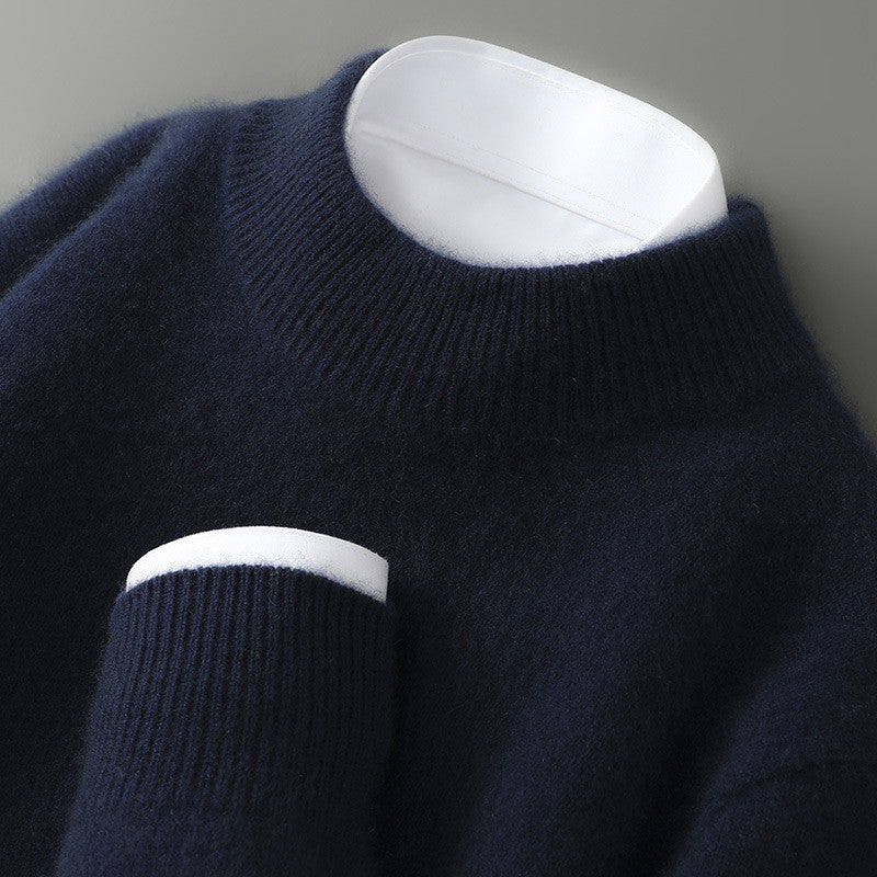 Men's navy knit sweater with ribbed crew neck and cuffs