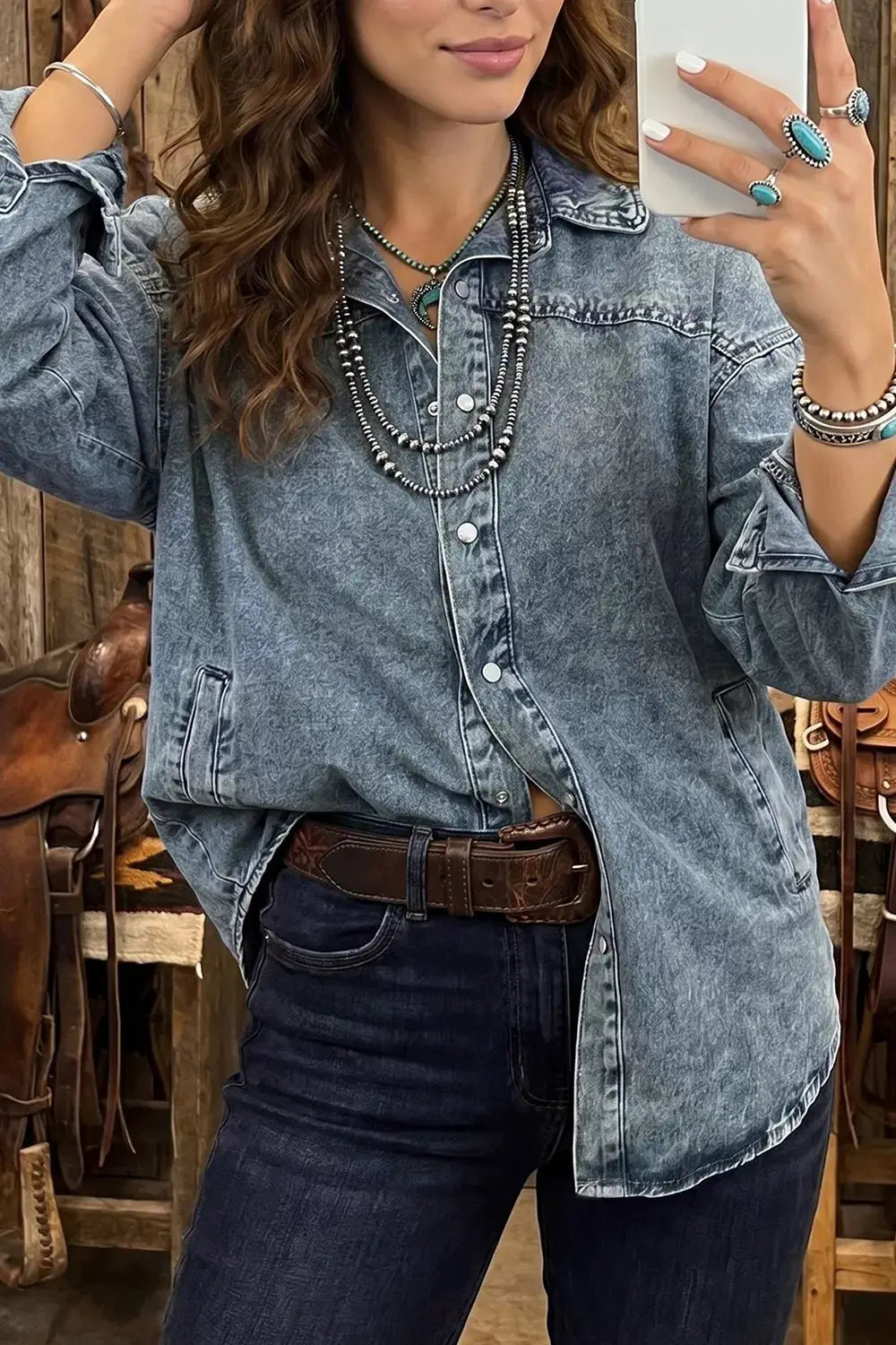 Western Long Sleeve Denim Jacket with button placket and pockets in blue washed denim.
