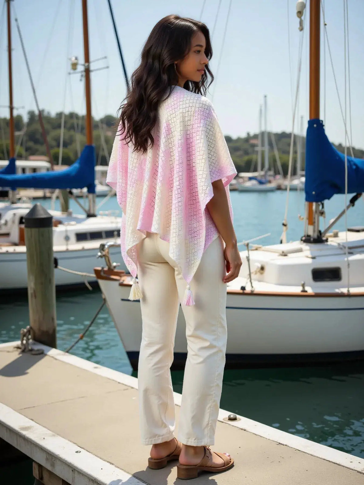 Lightweight gradient openwork knit tassel beach cover up in pink-to-cream colors