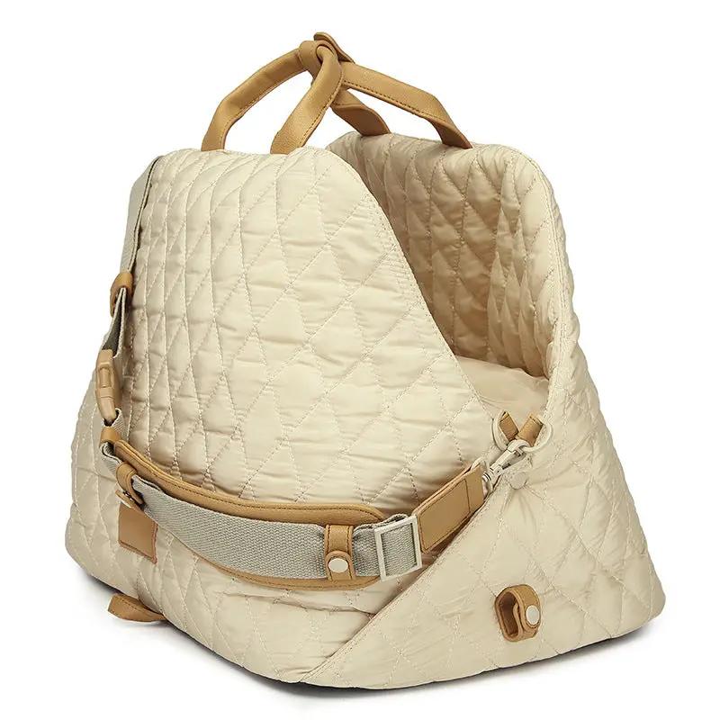 Pet Handbag by AdTec, beige quilted cat carrier with tan straps and adjustable waist strap