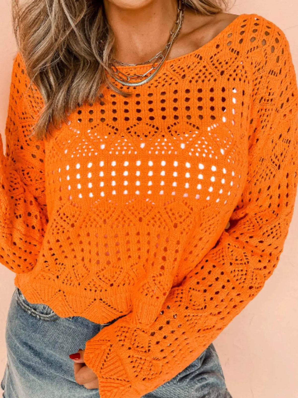 Openwork crochet boat-neck knit cover-up in bright orange by Trendsi; lightweight beachwear.