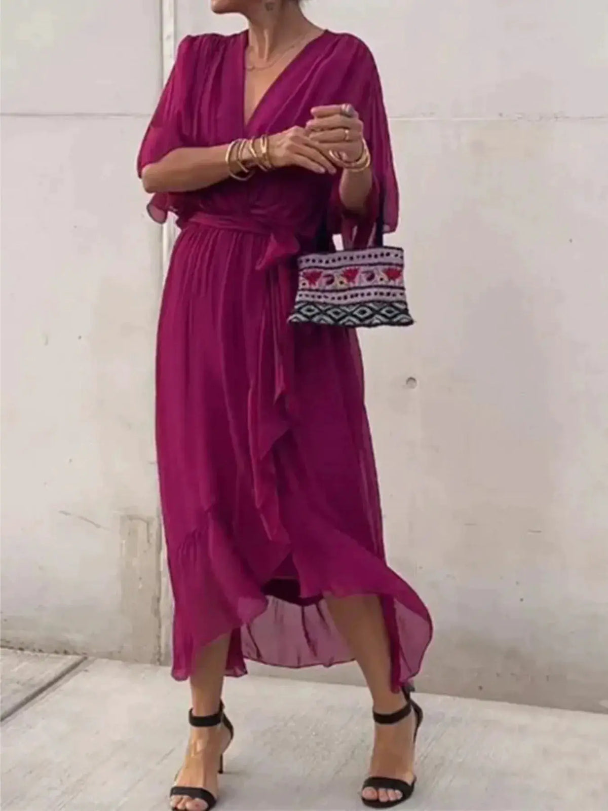 Plus-size magenta flowy tie-front midi dress with flutter sleeves