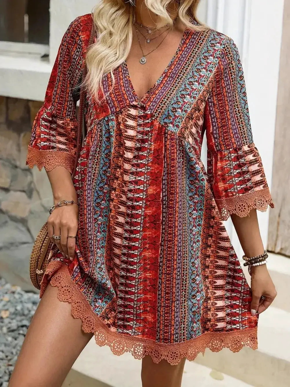 Lace trim printed V-neck 3/4 sleeve dress in rust-red multicolor pattern with peach lace hem
