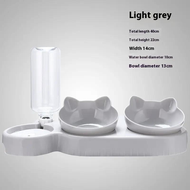 AdTec dual-bowl pet feeder with water bottle, light grey base, two bowls.