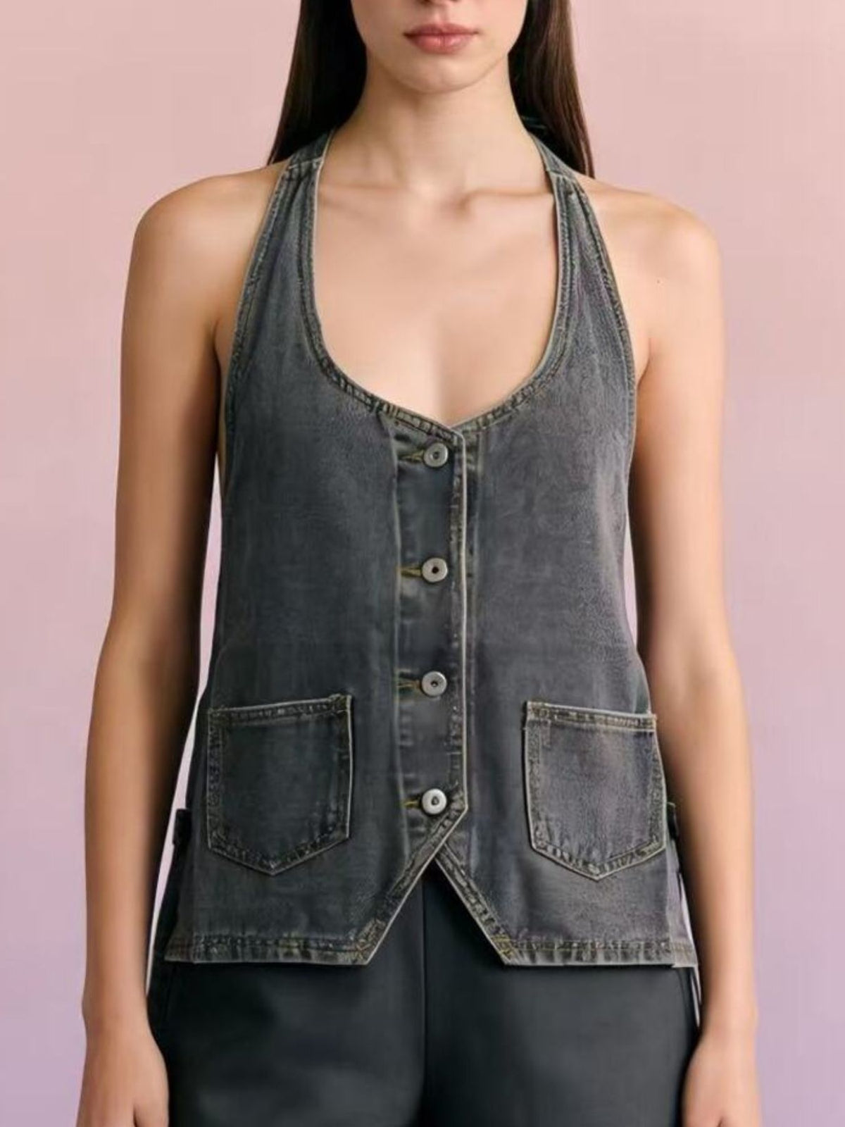 Halter-neck gray denim vest with button-front closure, adjustable tie, and two front pockets