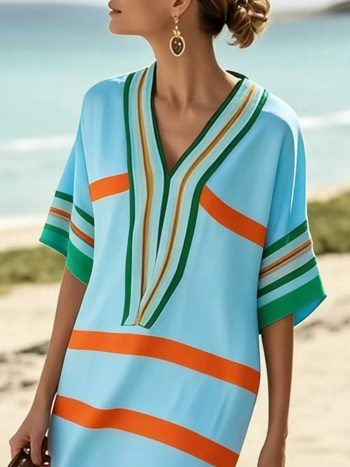 Trendsi full-size plus-size striped midi dress with short sleeves, light blue with orange and green stripes.