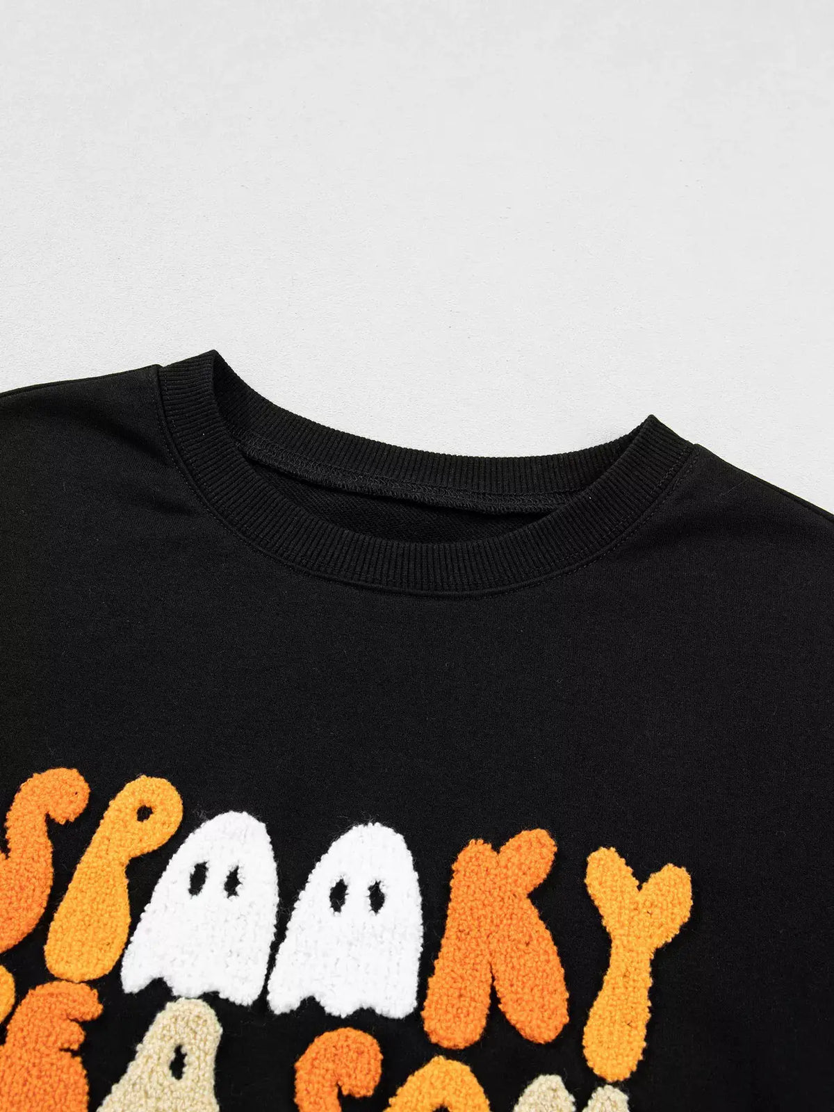 Embroidered Spooky Season long-sleeve sweatshirt, black with orange and white ghost graphic