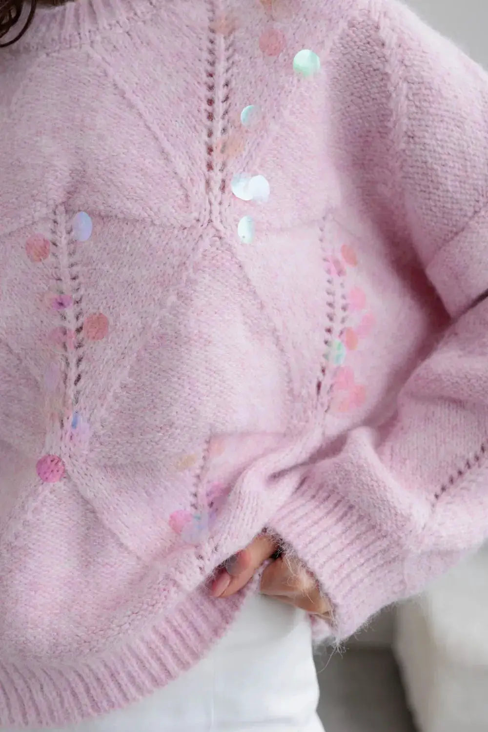 Shimmering sequin pink round-neck long-sleeve holiday sweater with fuzzy knit