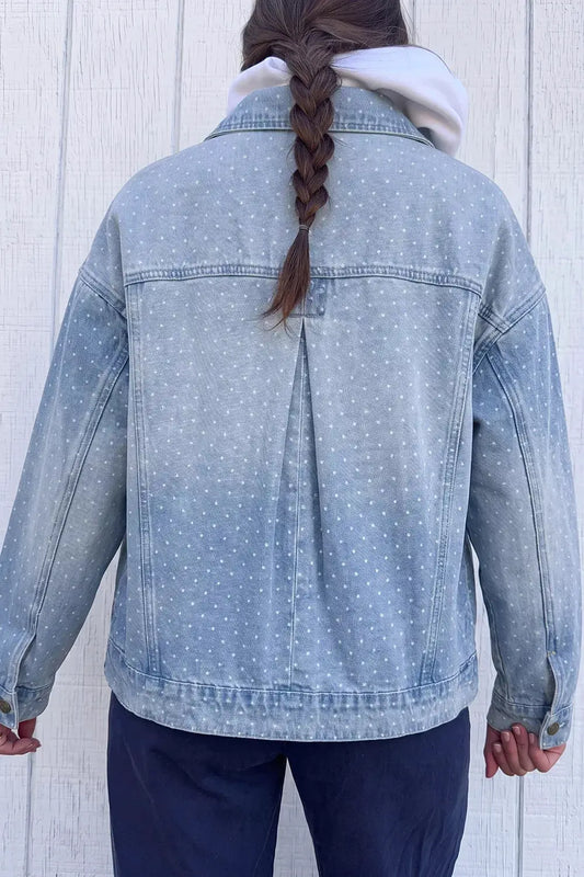 Polka dot long sleeve denim jacket in light blue wash with pockets; back center pleat detail