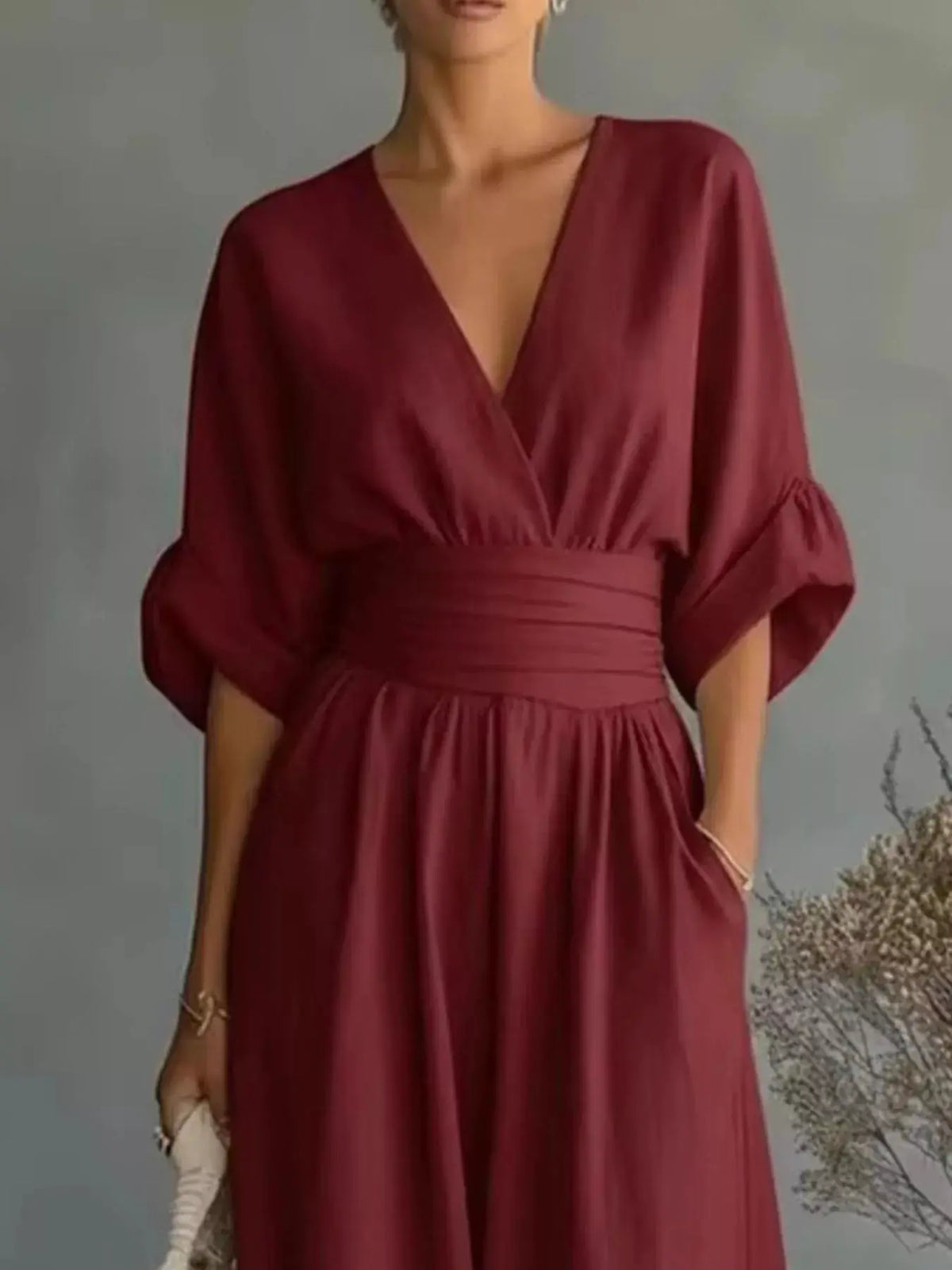 Full Size half-sleeve wide-leg jumpsuit in burgundy, plus size with deep V-neck