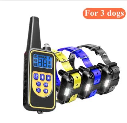 Remote control dog training device by AdTec with 4 color-coded collars and handheld controller for 3 dogs.