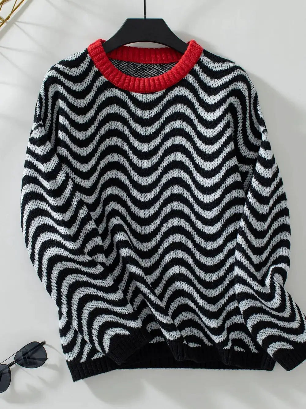 Casual Wavy Stripe Knit Sweater by Trendsi, black and white pattern with red ribbed round neck, long sleeves.