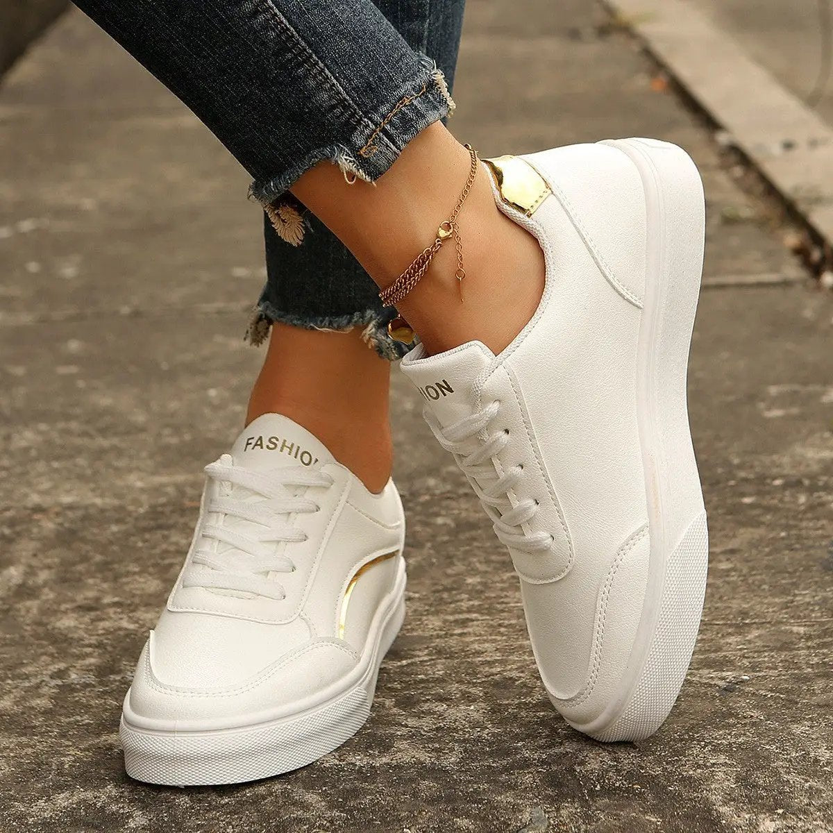 White lace-up sneakers with a chunky sole and round toe for women