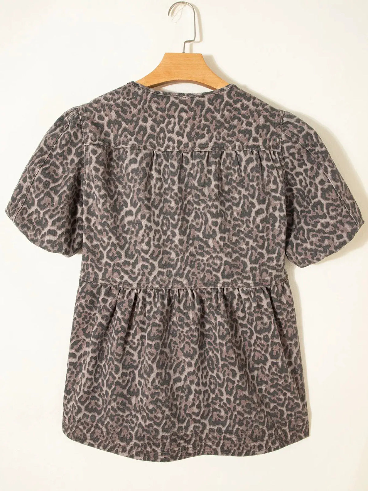 Women's leopard print denim top with puff sleeves and ruffle hem, gray by Trendsi.