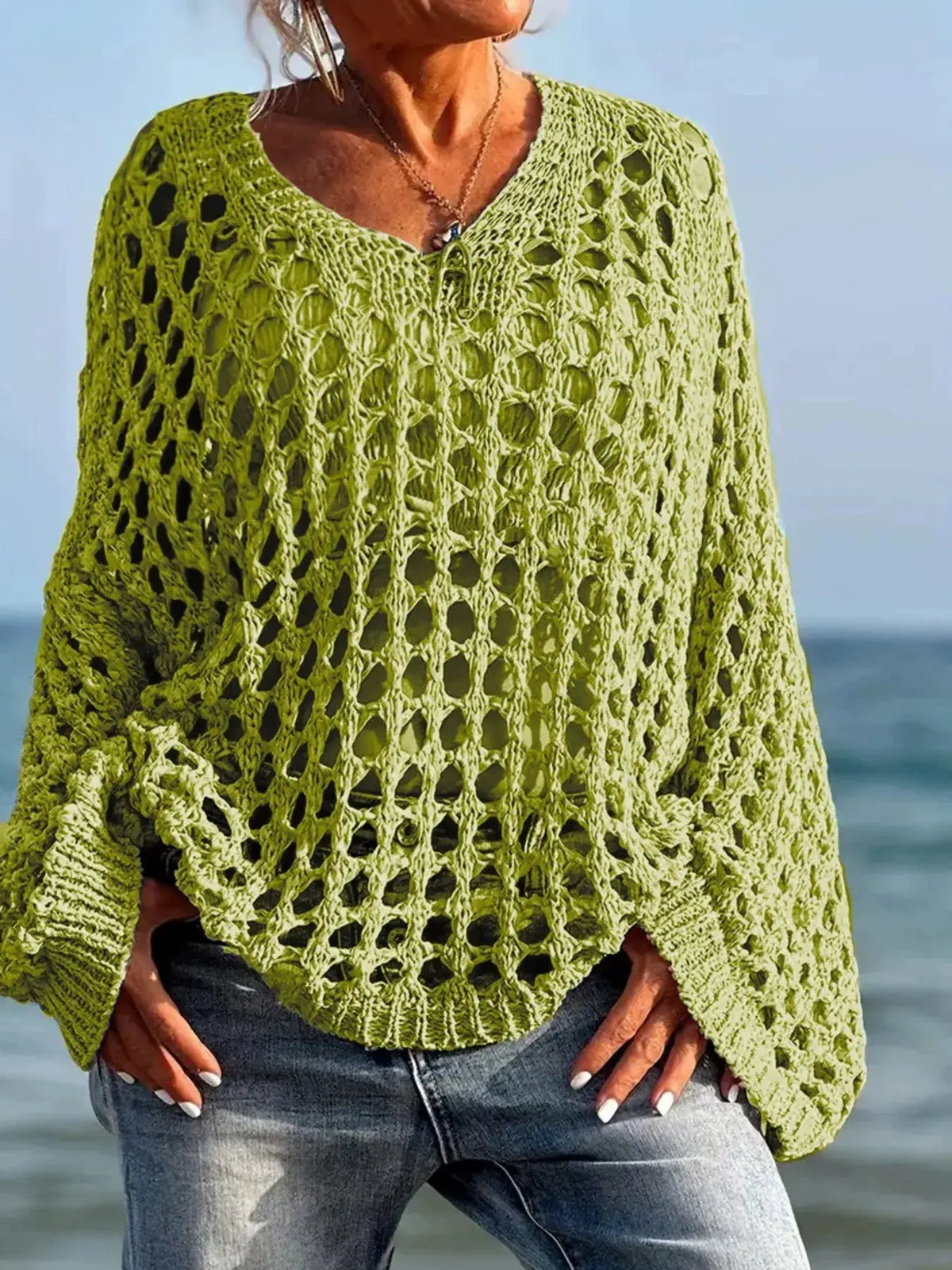 Crochet lightweight long-sleeve cover-up by Trendsi in lime green, oversized beach cardigan.