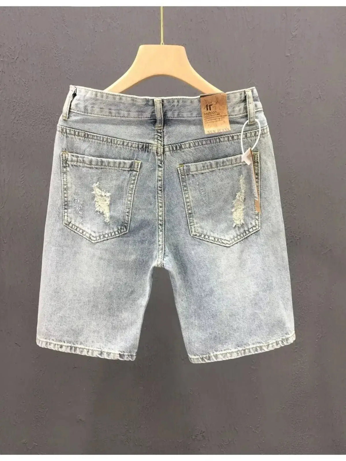 Men's Relaxed Distressed Washed Cotton Denim Shorts by Trendsi, light blue with ripped back pockets.