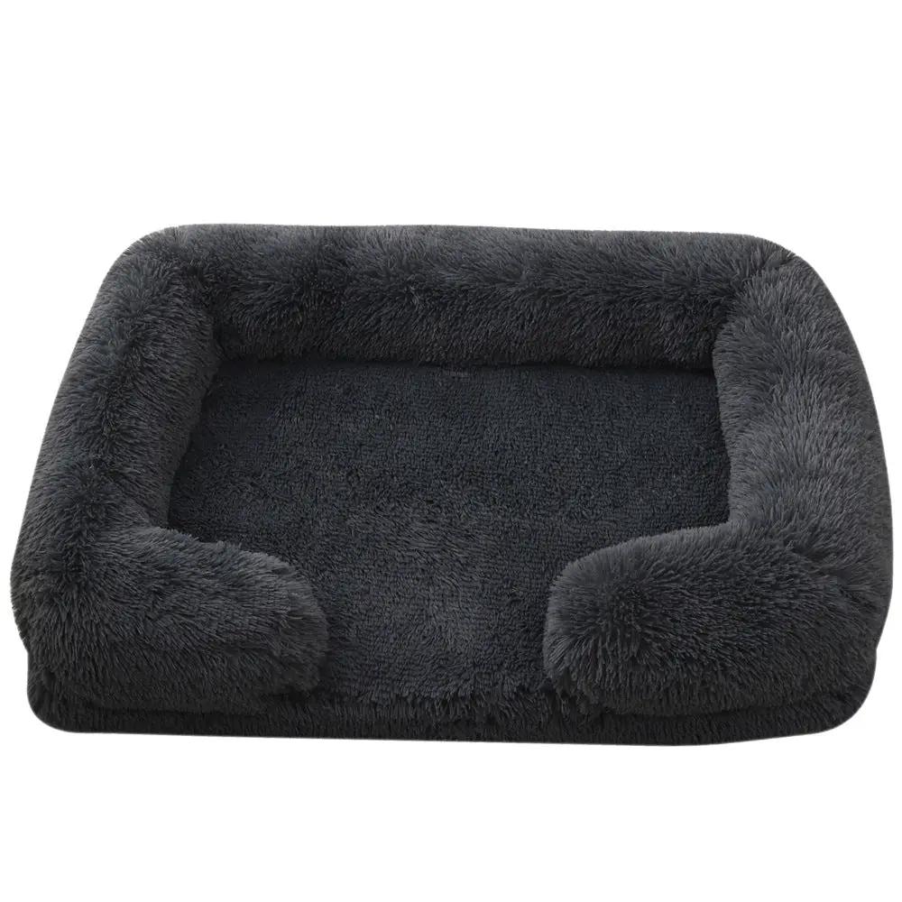 Plush round dog bed by AdTec, dark gray faux fur for winter warmth.