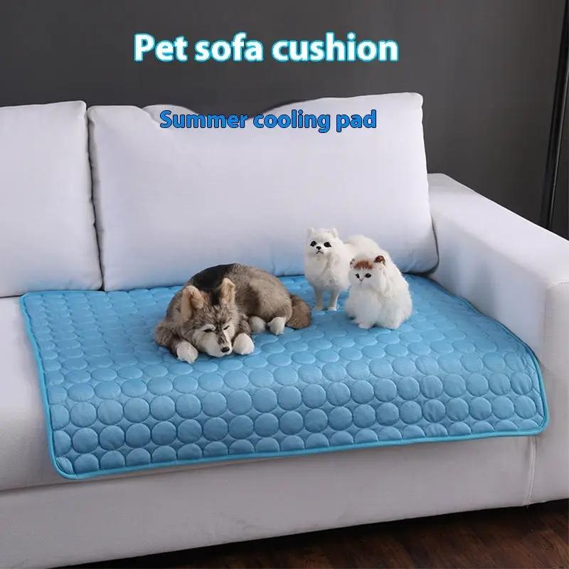 Dog cooling mat by AdTec, blue quilted cooling pad on sofa with three small dogs