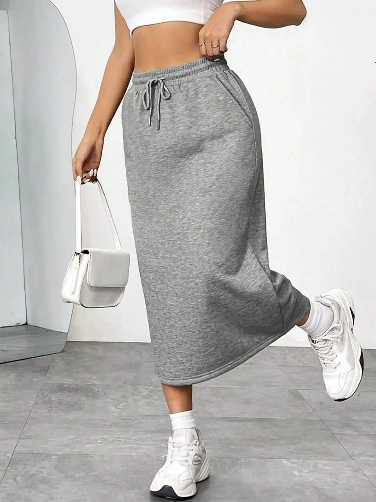 Slit drawstring midi skirt in gray knit by Trendsi