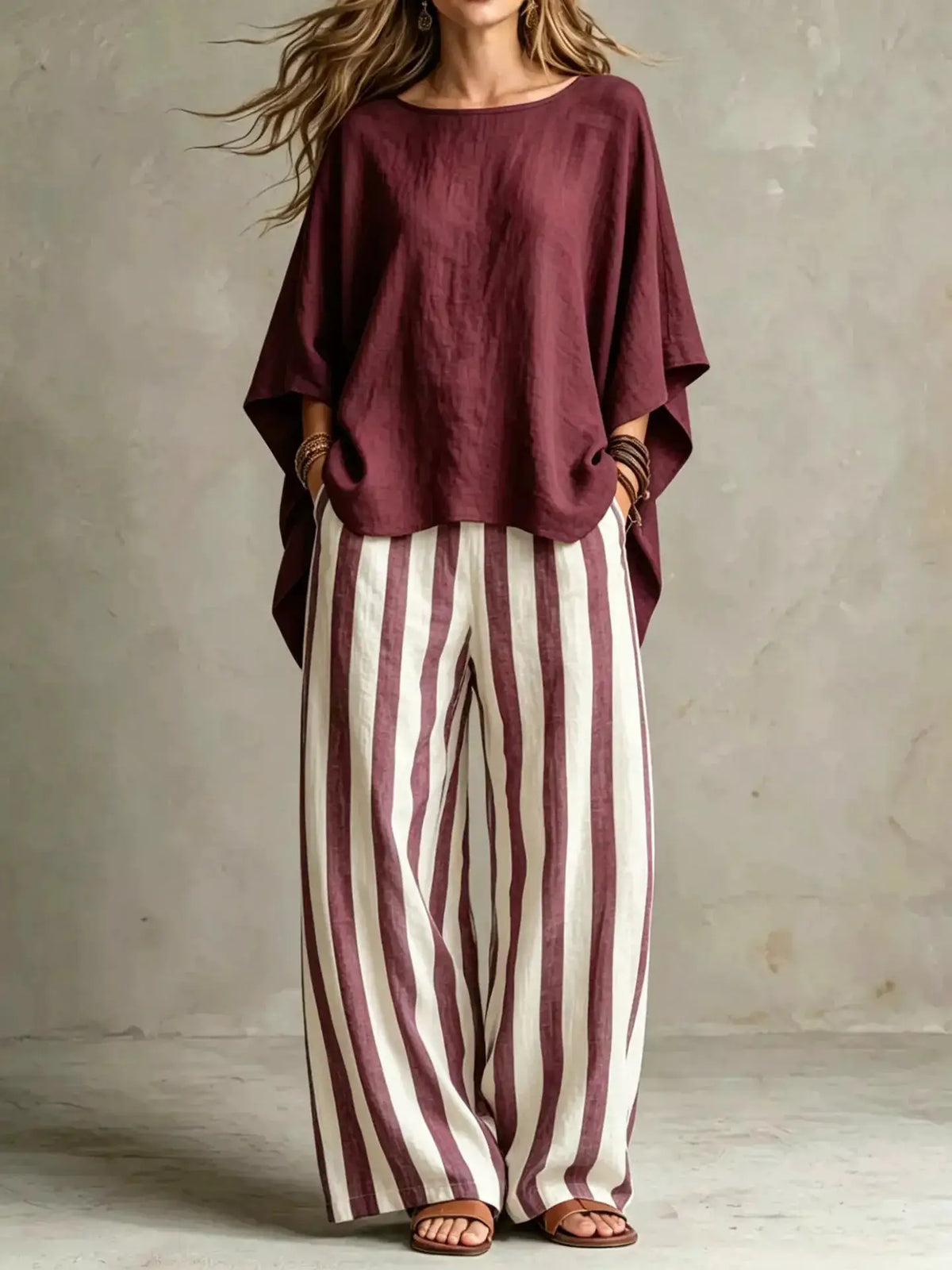 Plus-size Trendsi top and pants set; burgundy oversized top with burgundy and white striped wide-leg pants.