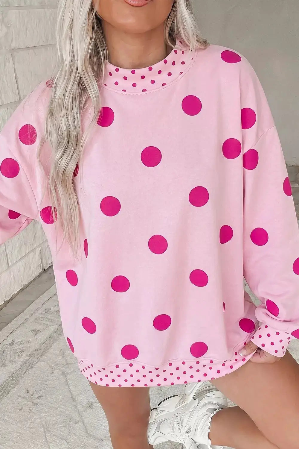 Polka Dot Dropped Shoulder Sweatshirt by Trendsi, light pink with magenta polka dots, oversized fit.