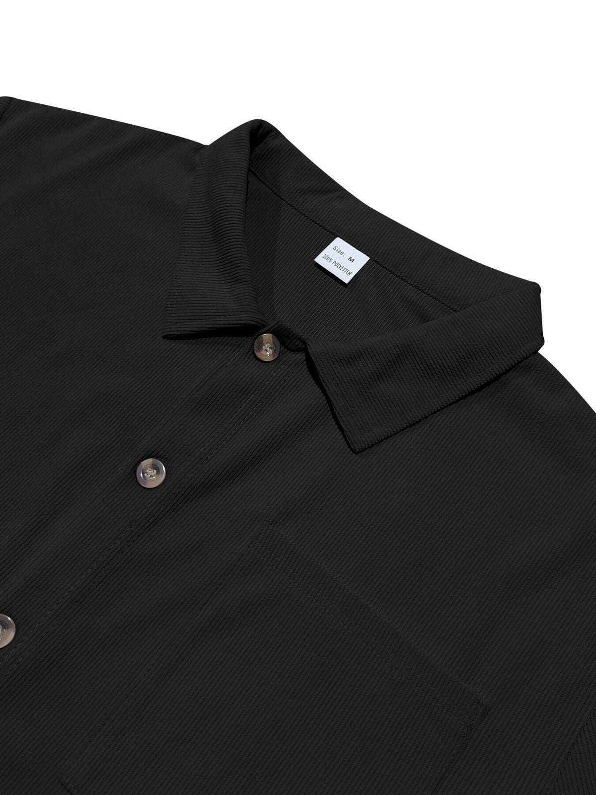 Men's black polyester button-up shirt close-up with collar and visible buttons; size M tag.