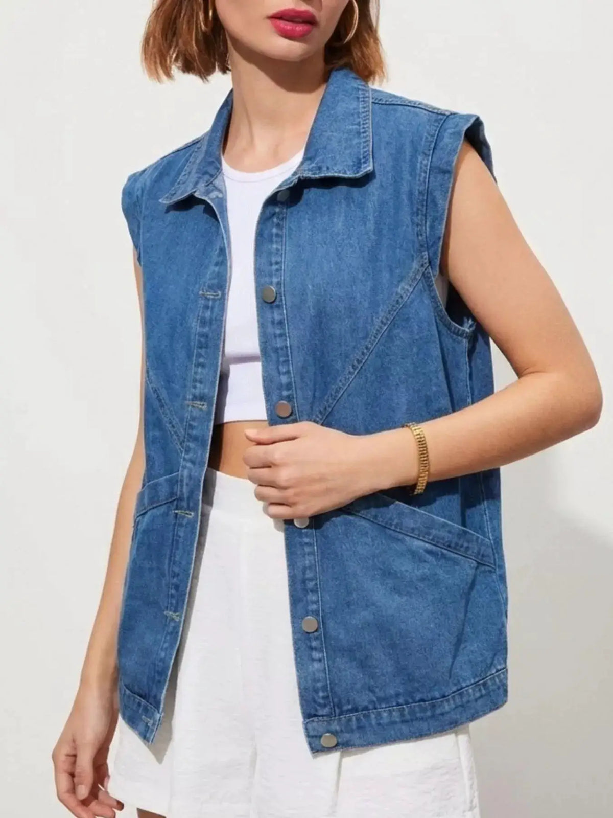 Denim vest by Trendsi, faded blue wash, sleeveless with button-front and silver hardware, relaxed fit