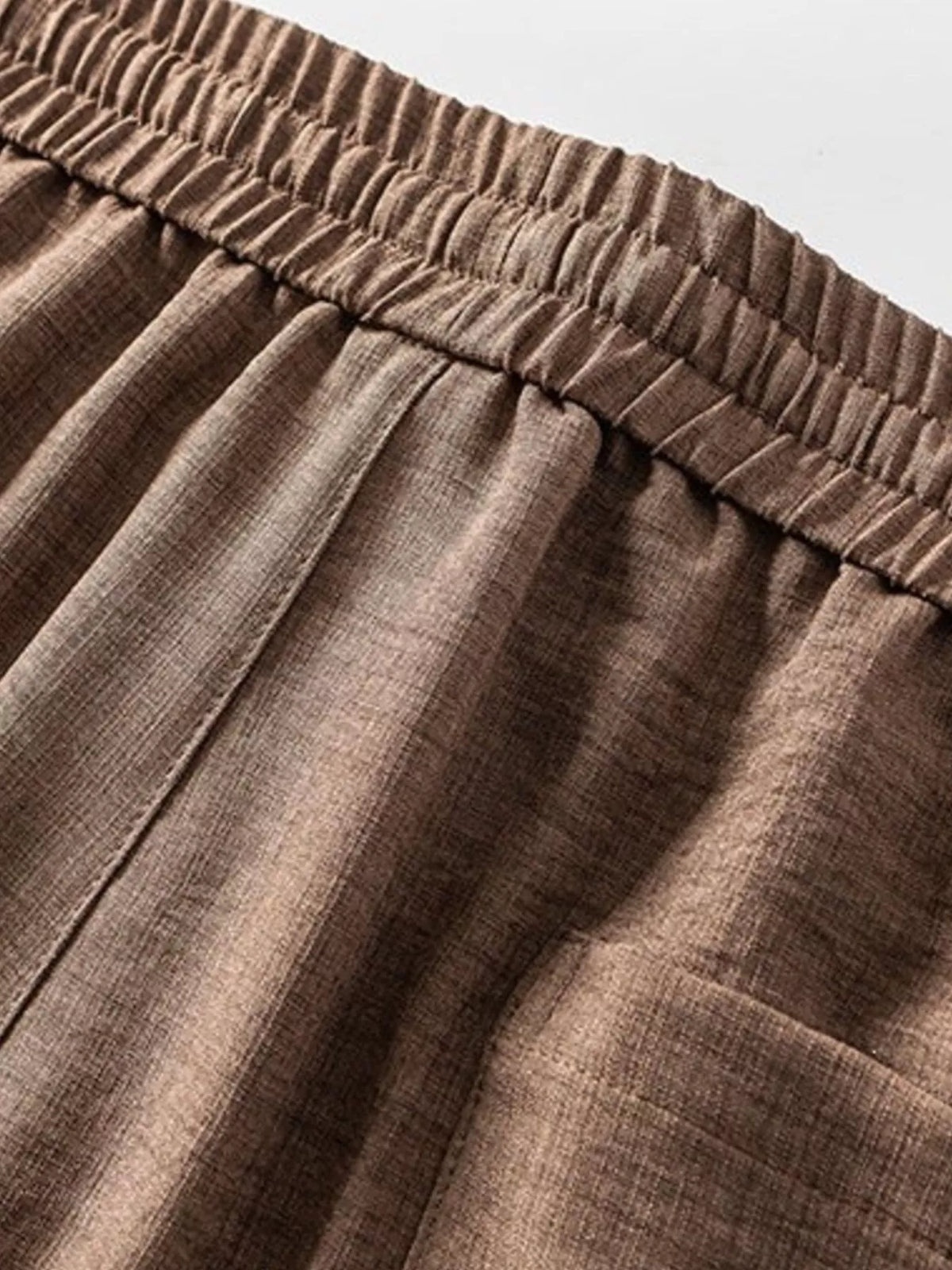 Men's plus-size shorts in brown linen-like fabric with elastic waistband