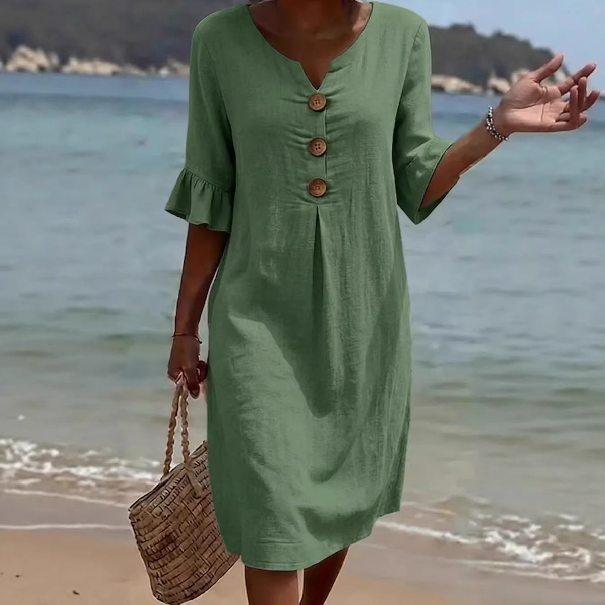 Summer Womens Solid Colored Cotton Dress in sage green with front wooden buttons, knee-length