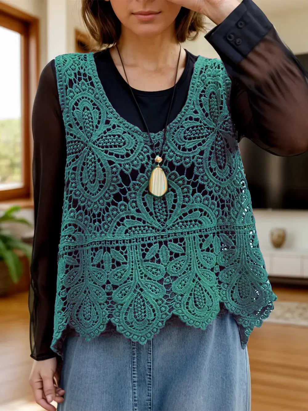 Lightweight pure cotton sleeveless scoop-neck cutout cover up in teal lace worn over black top