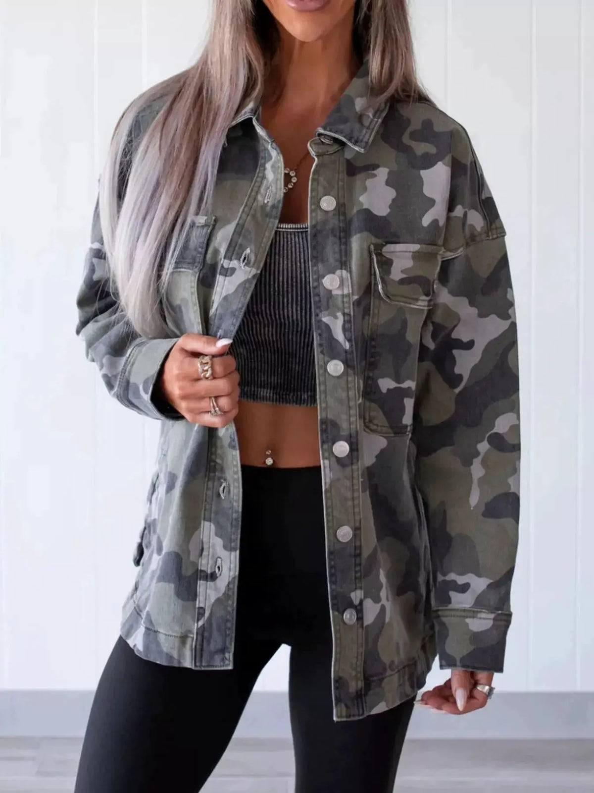 Camouflage denim jacket with button-front closure and utility chest pockets