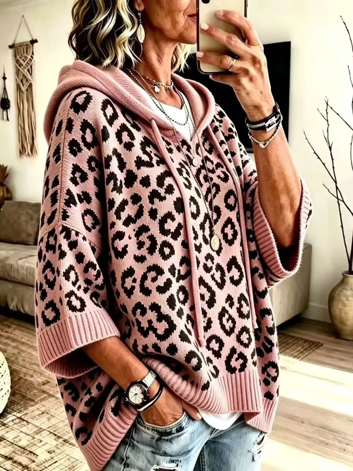 Drawstring leopard hooded sweater in pink knit with black spots