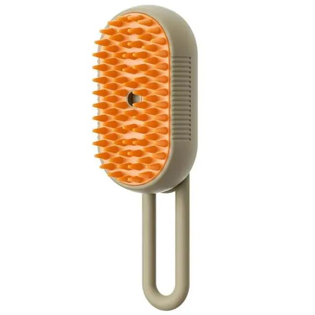 Cat steam brush 3-in-1 grooming tool with orange bristle head on beige body.