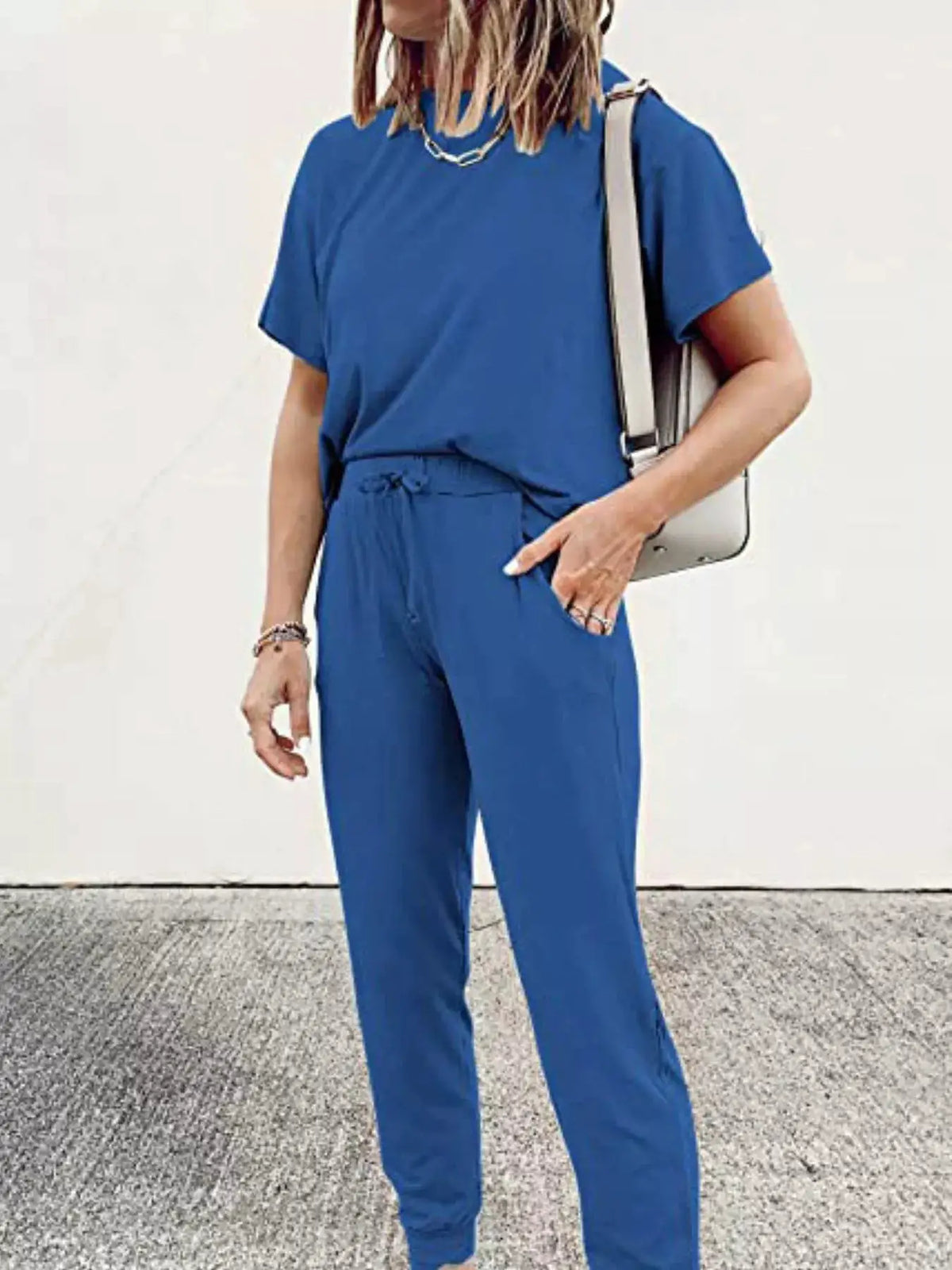 Full Size Round Neck Top and Drawstring Pants Set in blue; plus-size outfit.