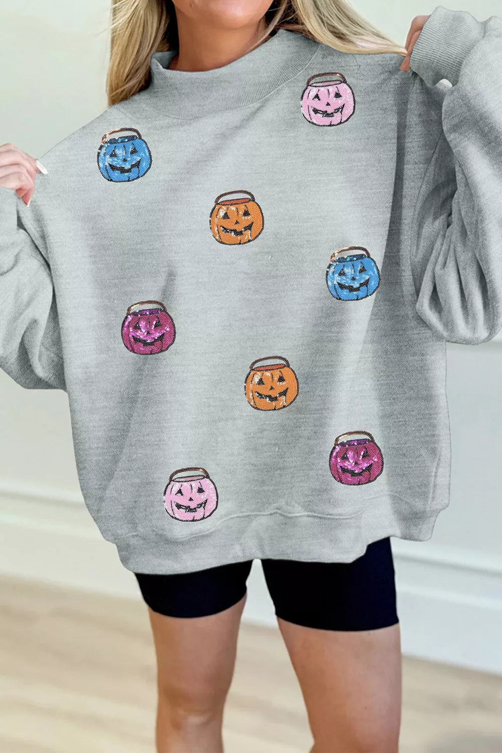 Halloween Pumpkin long sleeve sweatshirt in gray with allover multicolor jack-o'-lantern print