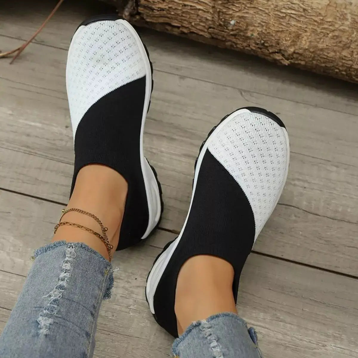Color Block Mesh Athletic Shoes by Trendsi; black and white slip-on flats with breathable knit mesh uppers.